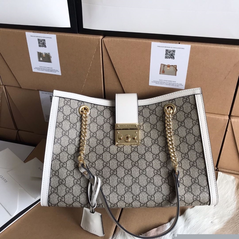 G*u*i shopping bags
